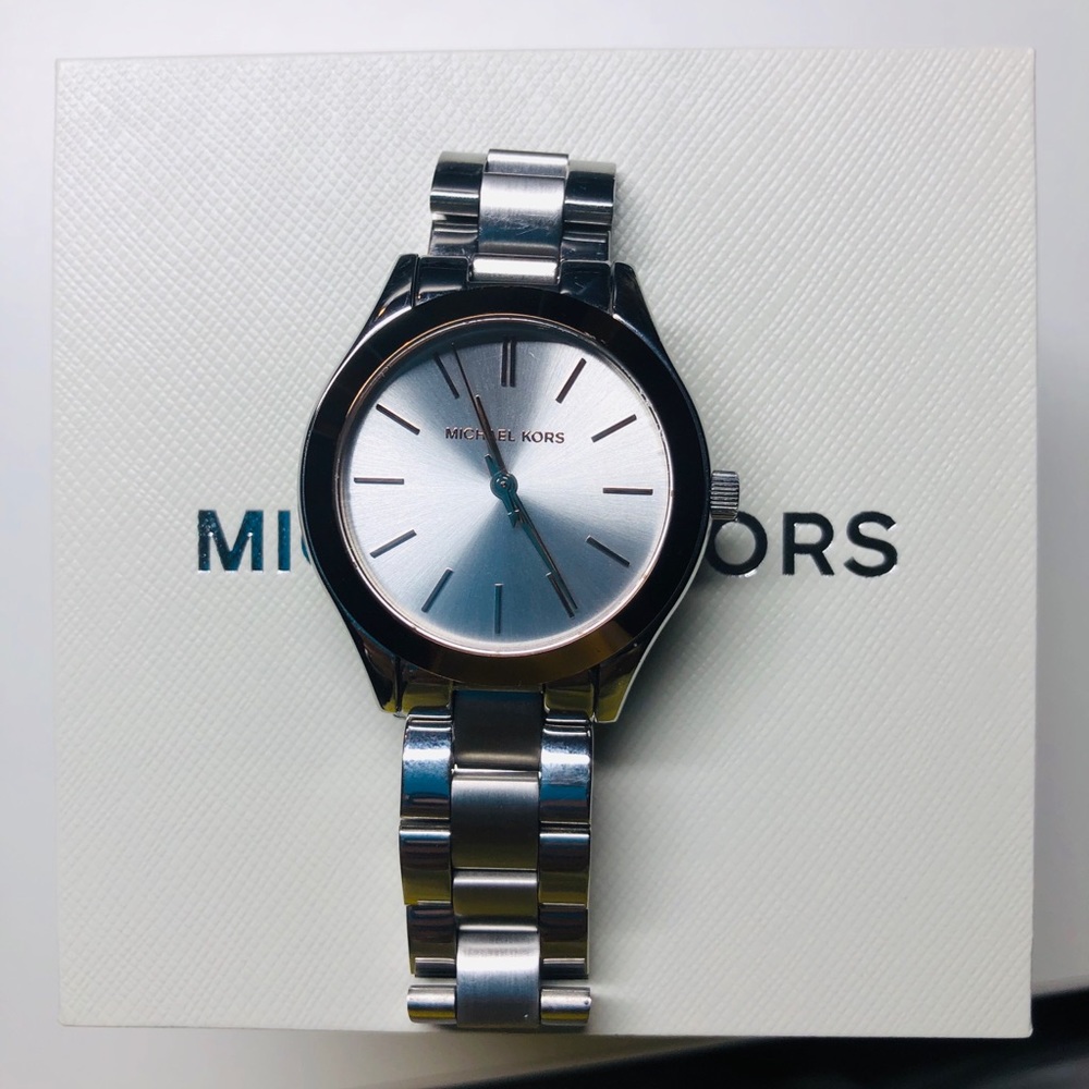 Gently used Michael Kors stainless, quartz watch.